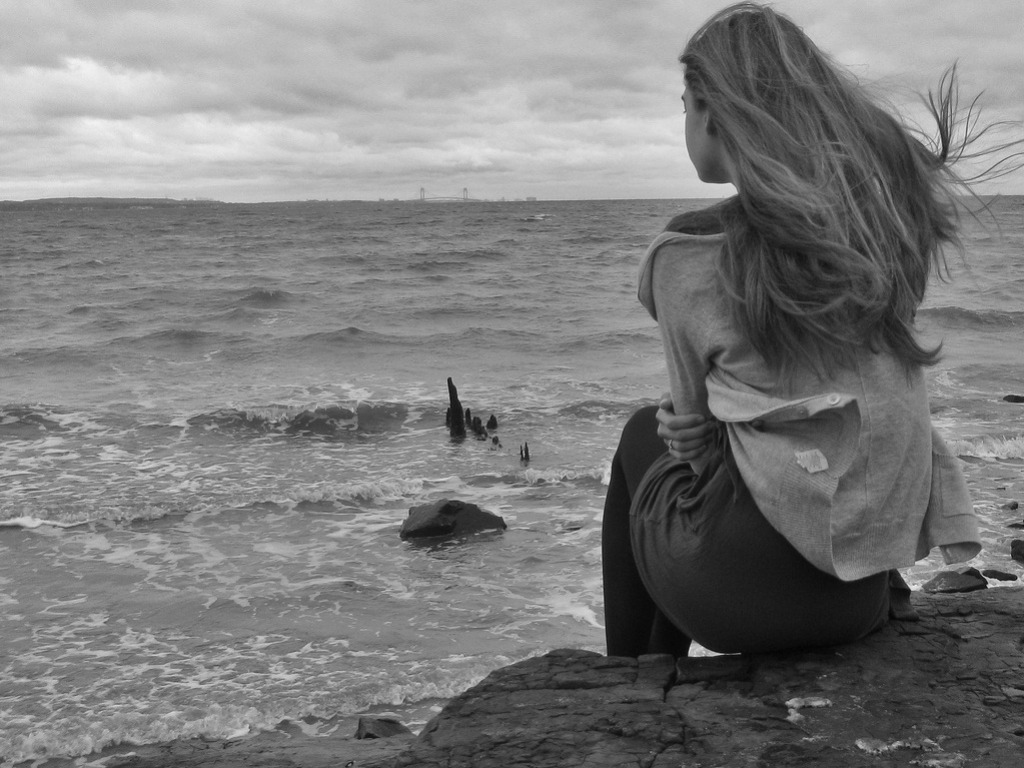 Love or Romance photos: Sad Girl Sitting on Beach